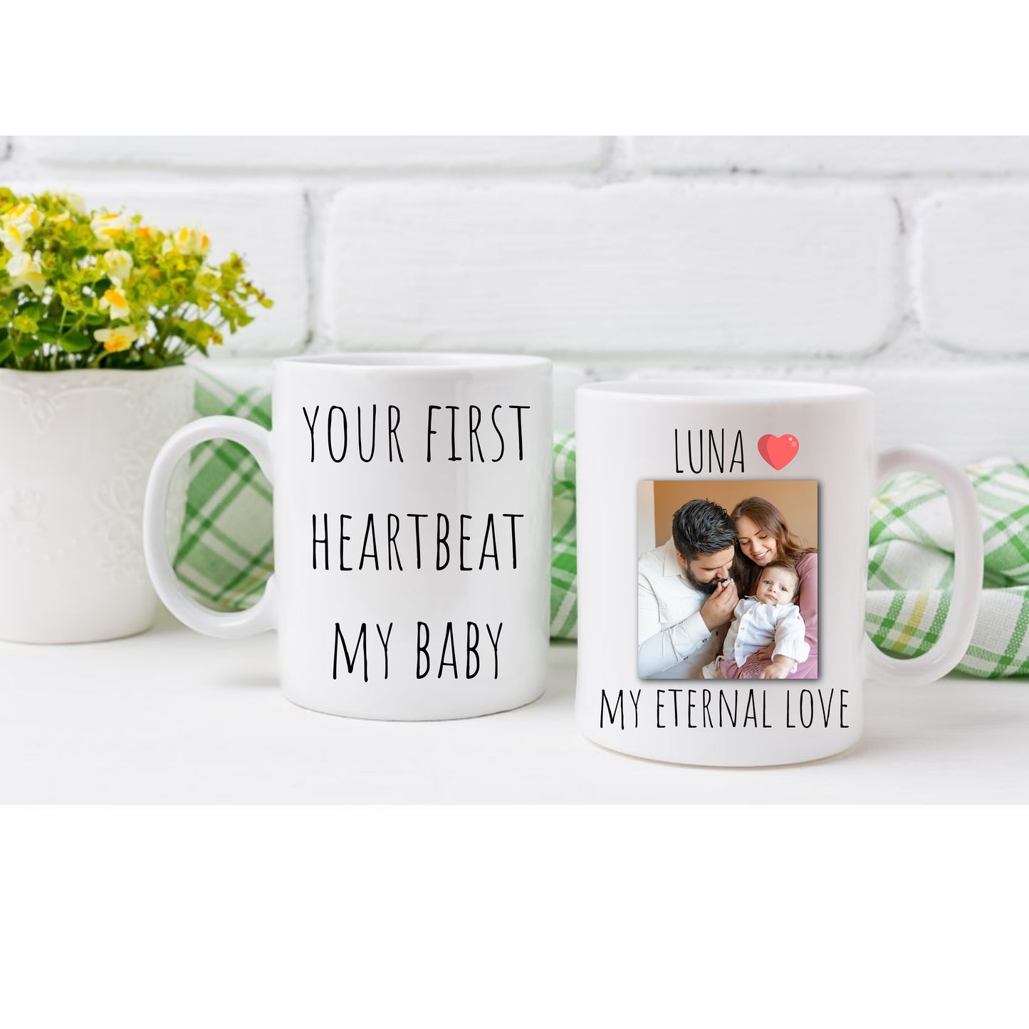 Two Personalized ceramic coffee mugs featuring the touching caption, “your first heartbeat, my baby, my eternal love” and "Luna my eternal love".