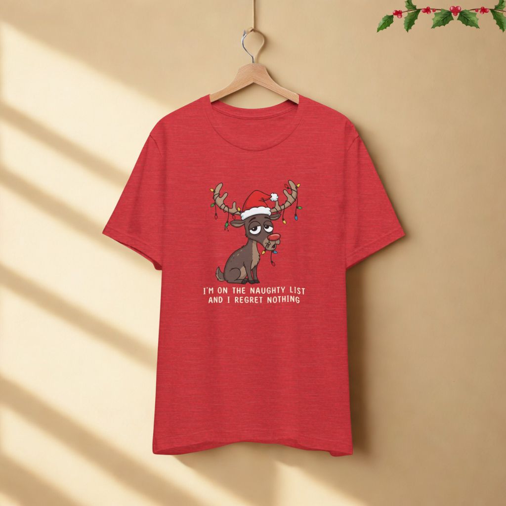 I’m on the Naughty List and I Regret Nothing funny Christmas t-shirt in heather red color displayed on hanger against neutral background.