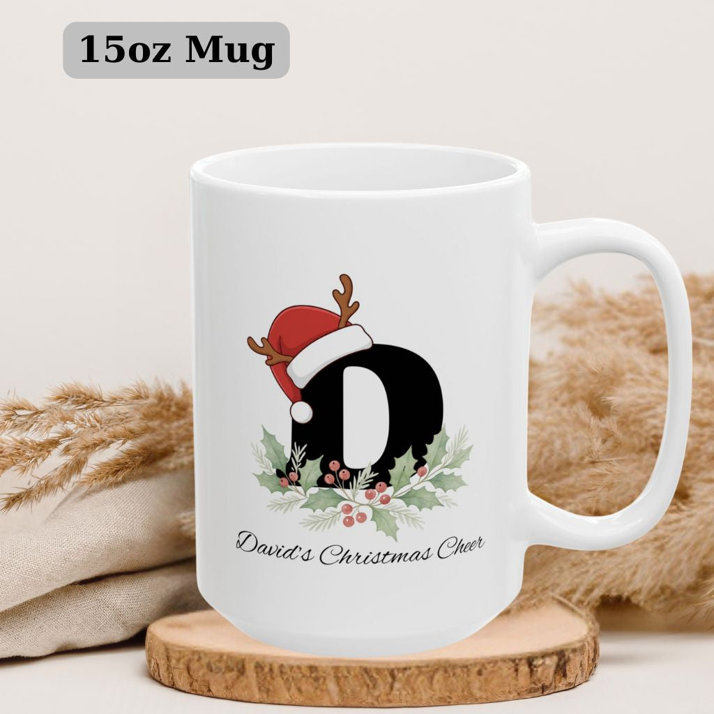 White 15oz ceramic mug with red handle and custom Christmas letter design.