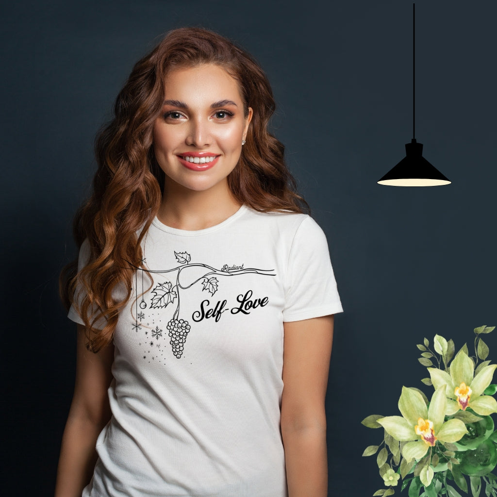 A beautiful girl wearing white shirt which features a minimalist illustration of a grapevine and the heartfelt message Self-Love