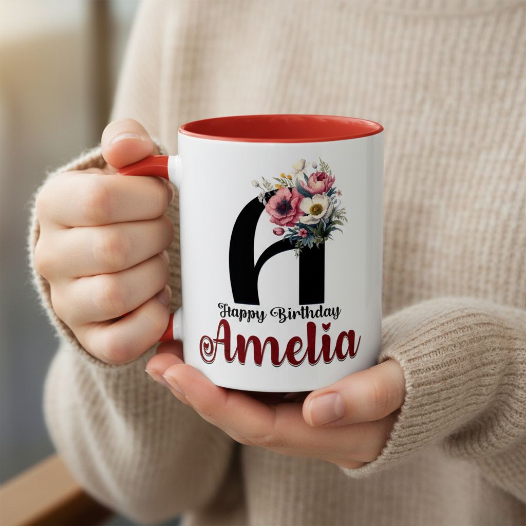 Woman holding 11oz birthday coffee mug with floral design